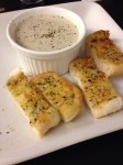 More creamy than chunky, but great garlic side!